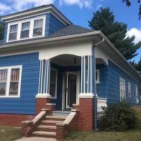 Finished exterior paint for house in vibrant blue